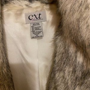 Women’s full length faux fur coat size 3x.